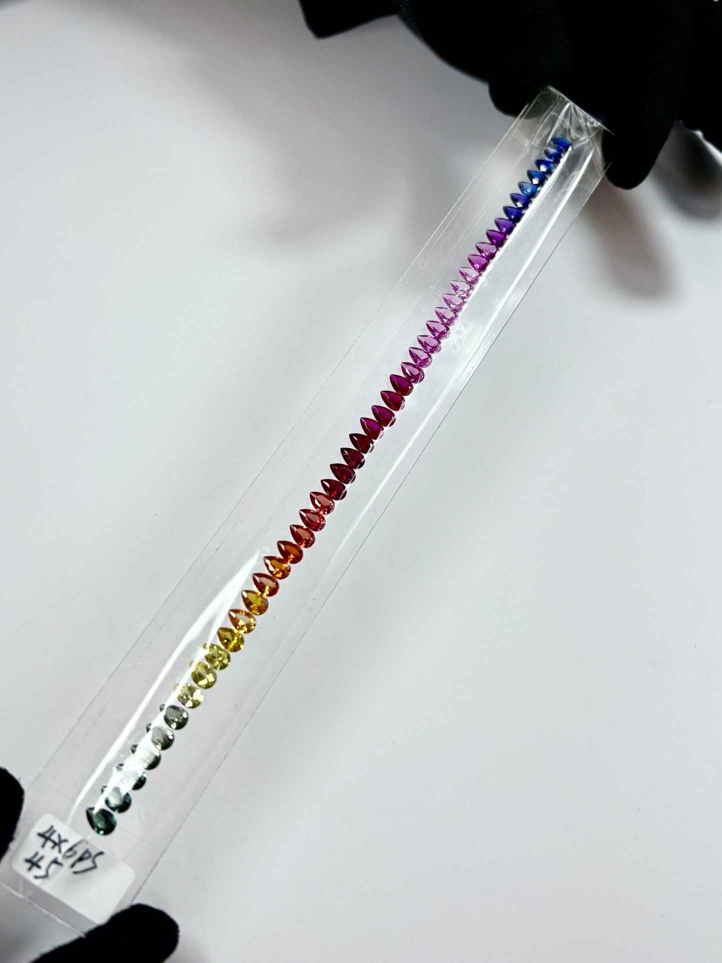 ZAFIRO RAINBOW LAB PERA 3 X 5 Y 4 X 6 MM