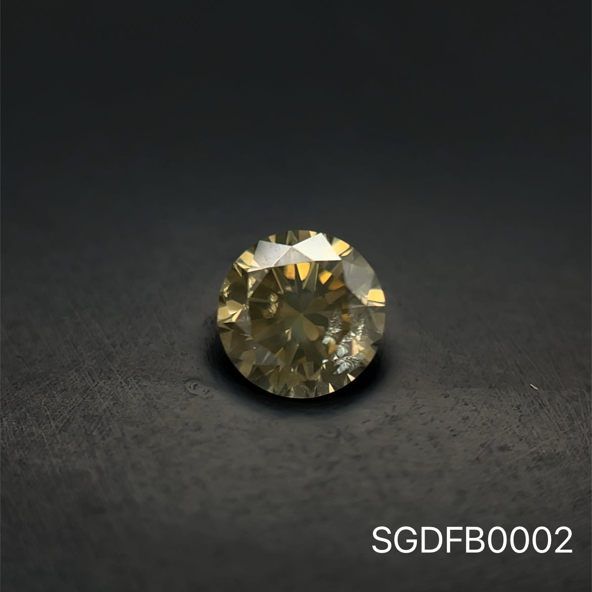 DIAMANTE BRILLANTE FANCY BROWN 0.675 CTS 5.5MM
