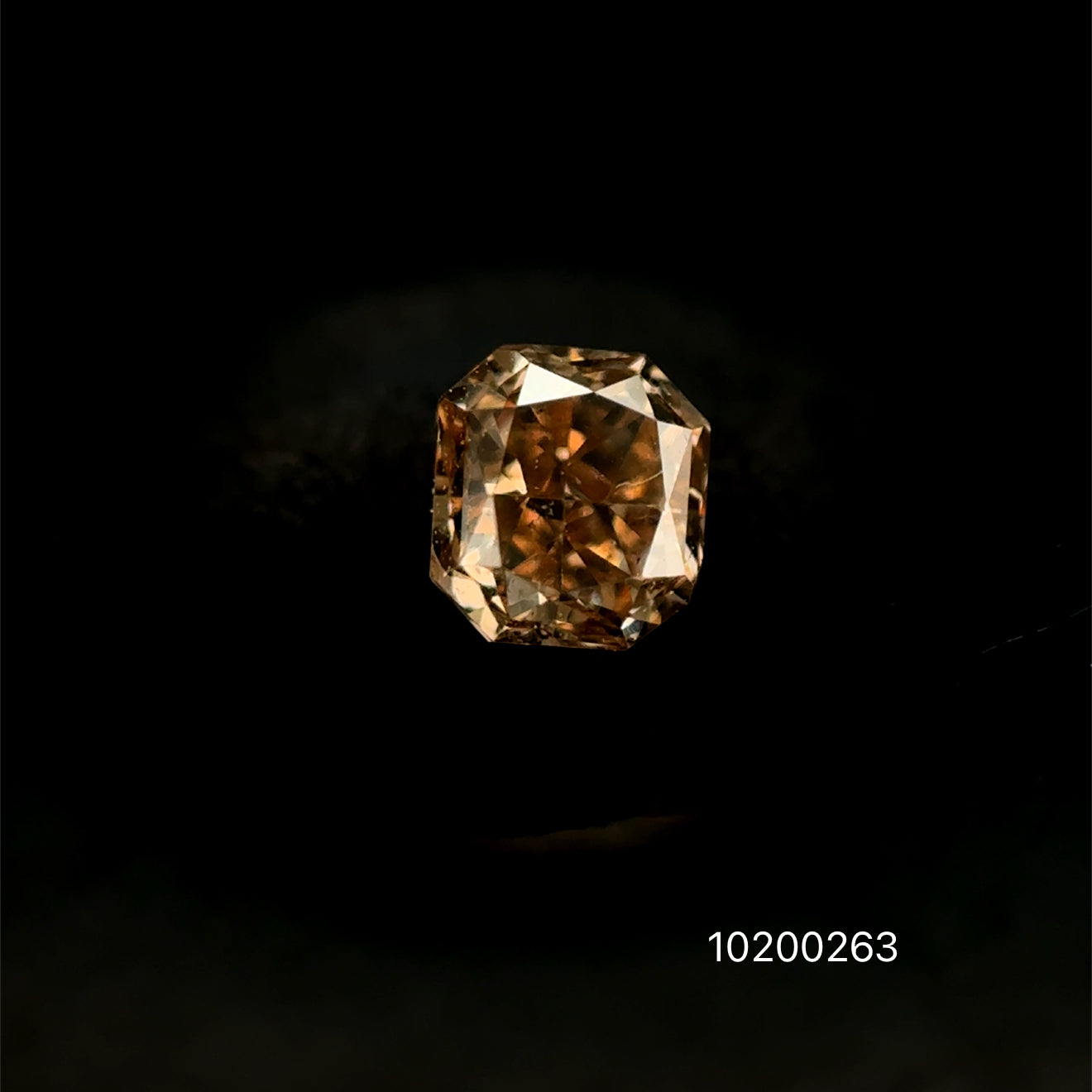 DIAMANTE FANCY LIGHT BROWN ASSCHER O.26 CTS