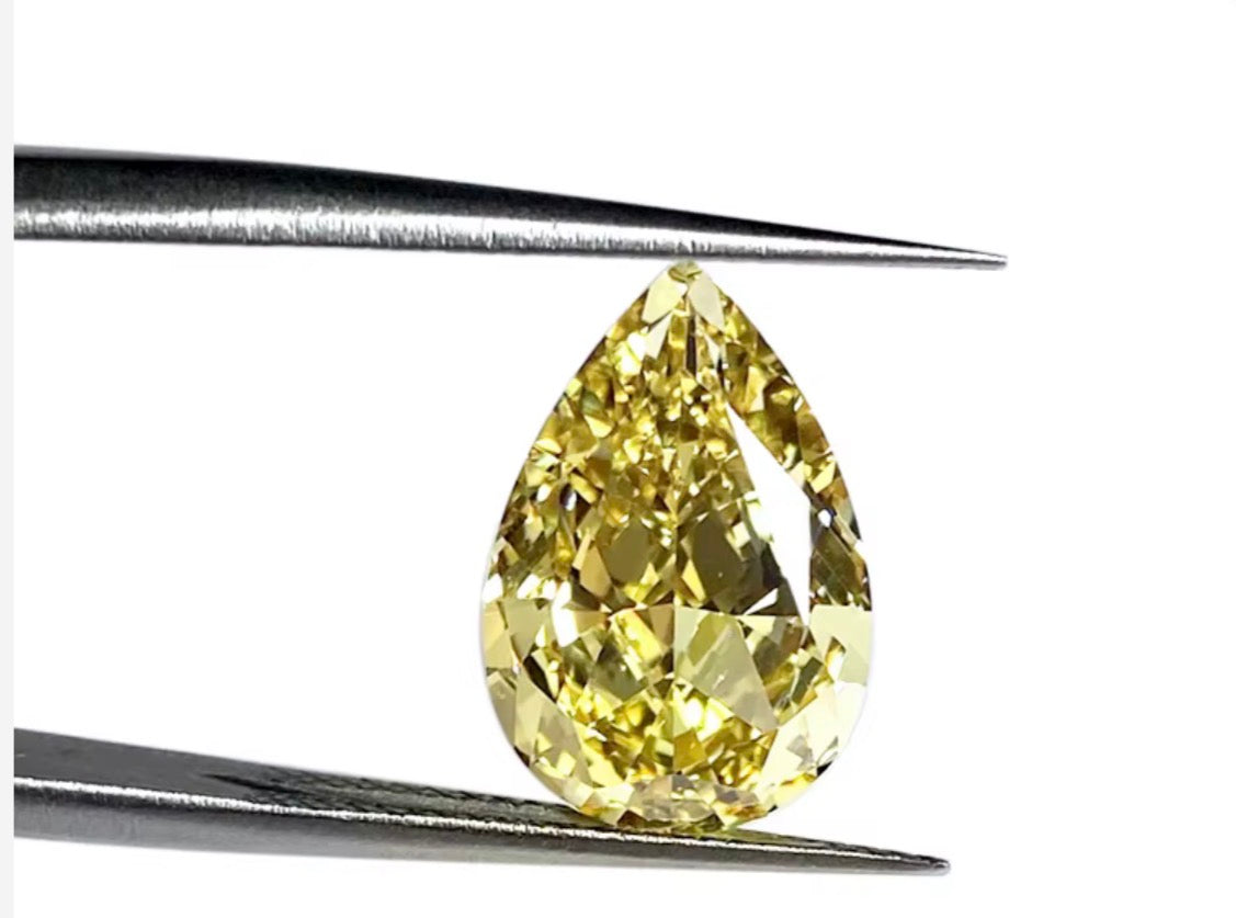 DIAMANTE DE LABORATORIO IGI  FANCY VIVID YELLOW CORTE PERA