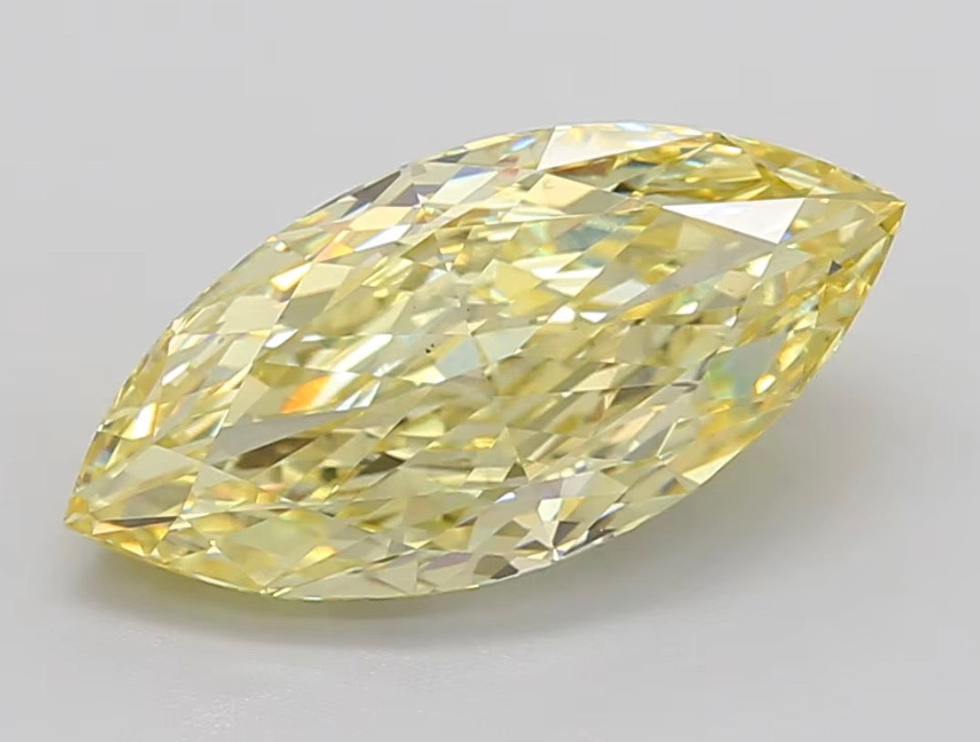 DIAMANTE DE LABORATORIO IGI  FANCY VIVID YELLOW CORTE MARQUISSE