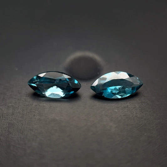 PAR DE TOPACIO BLUE LONDON CORTE MARQUISSE 1.215 CTS 7.8 X 3.9 MM
