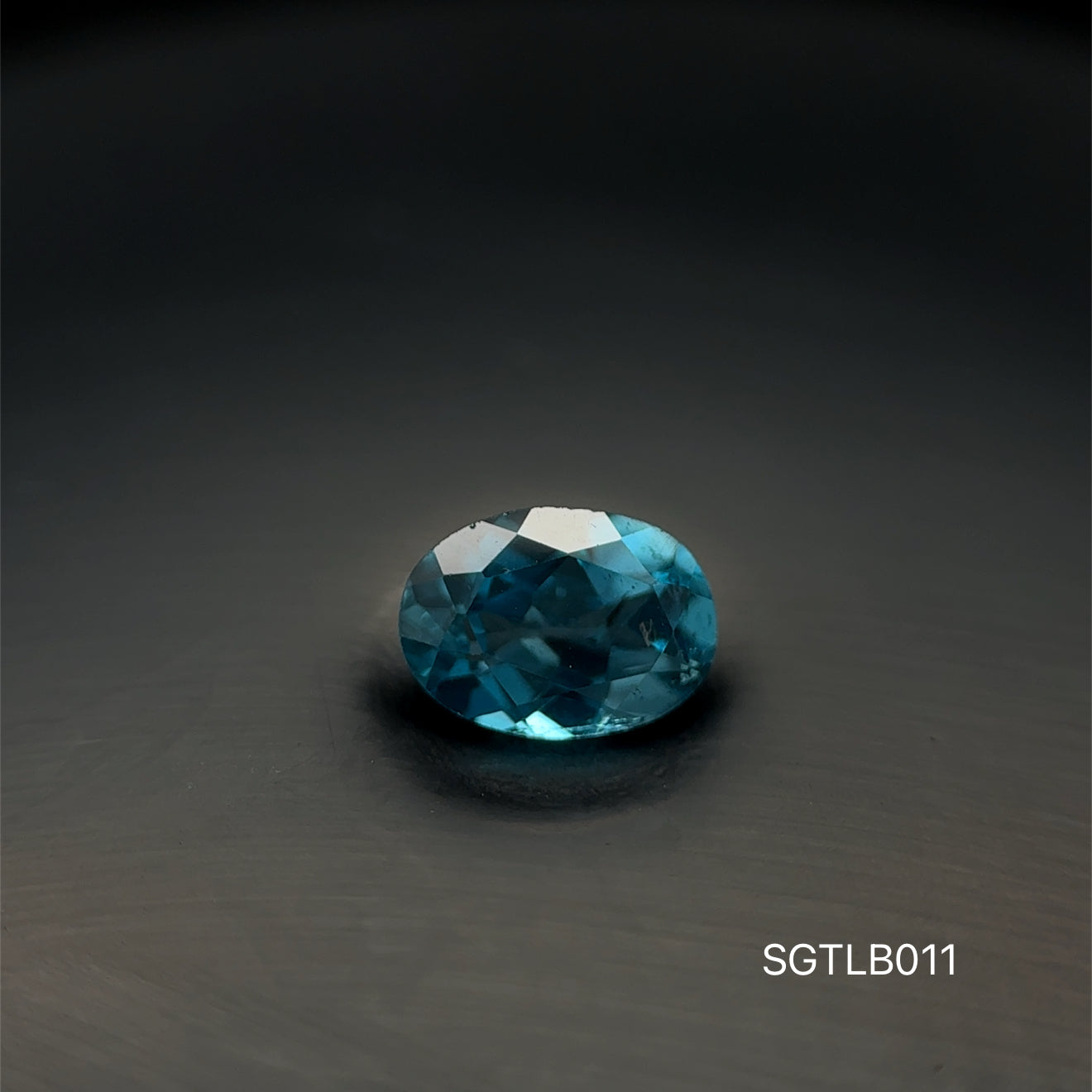 TOPACIO BLUE LONDON, CORTE OVAL, .920 CT/ 5  X 7 MM
