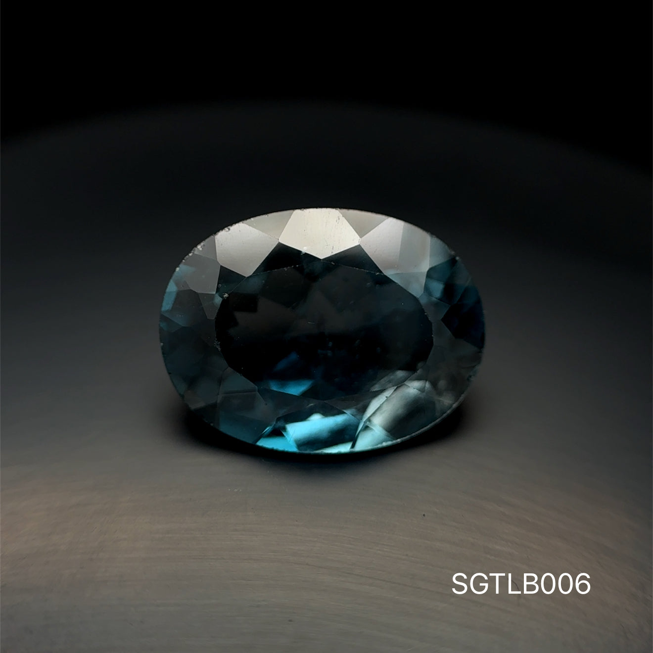 TOPACIO BLUE LONDON, CORTE OVAL, 11.355 CT, 12.23 X 16.20 MM