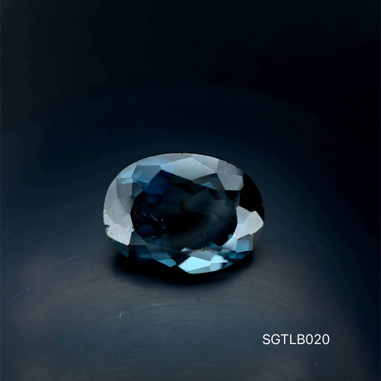 TOPACIO BLUE LONDON CORTE OVAL 12.25 CT / 11.9  X 15.9  MM