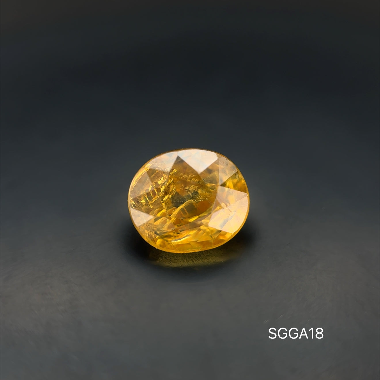 GRANATE AMARILLO OVAL  2.51 CT/ 6.87 X 7.95 MM