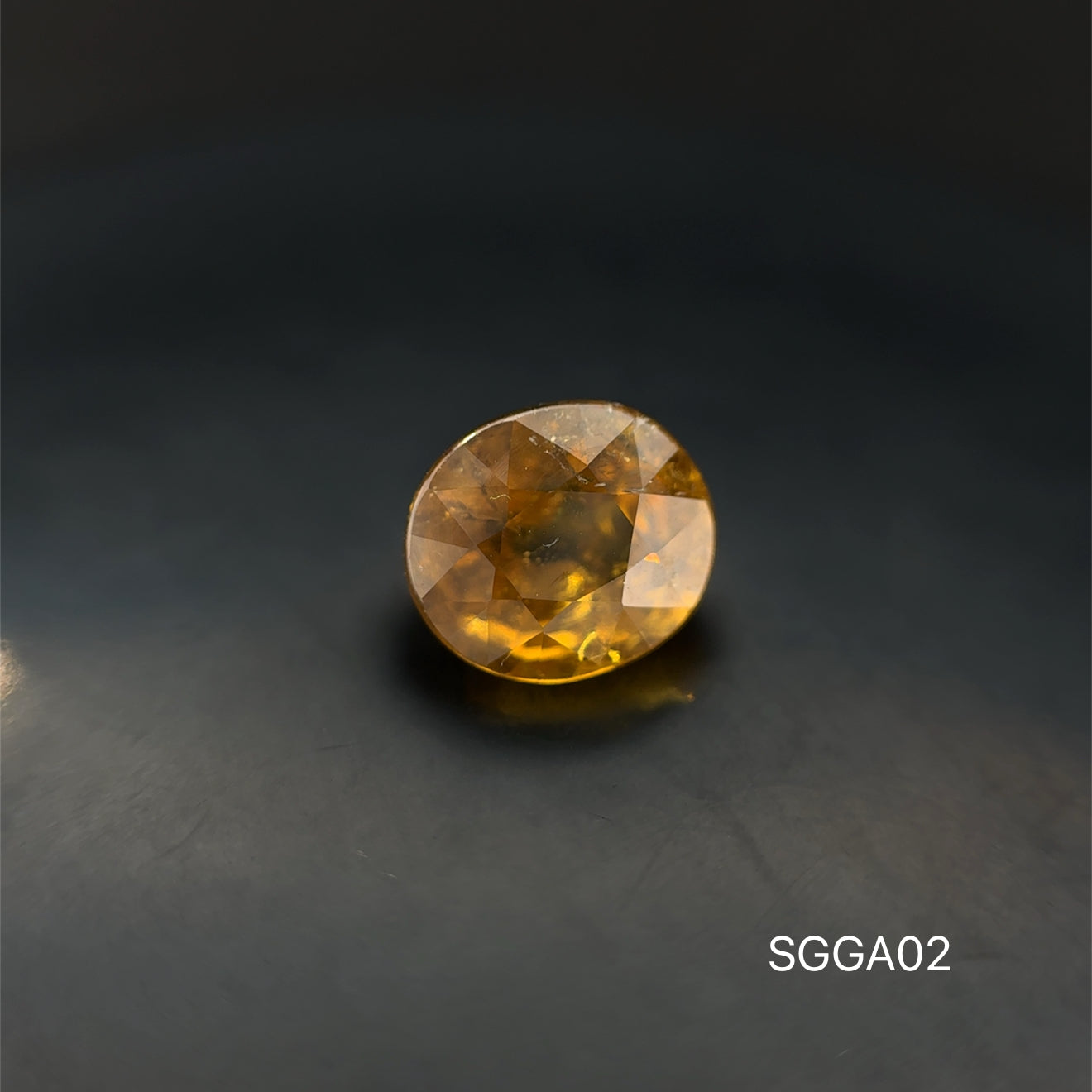 GRANATE AMARILLO OVAL  3.55 CT/ 7.69 X 8.76 MM